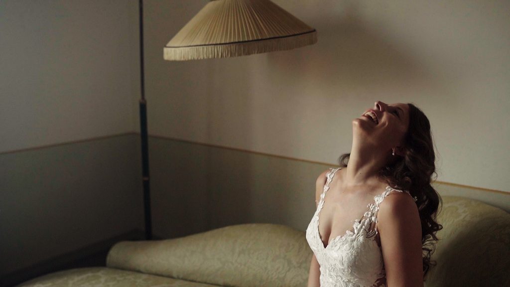 bride smiling during her getting ready her destination wedding
