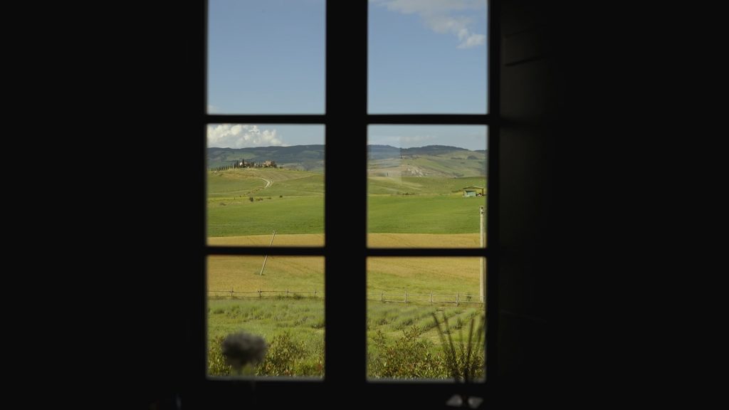 panorama view of tuscan hills from a window