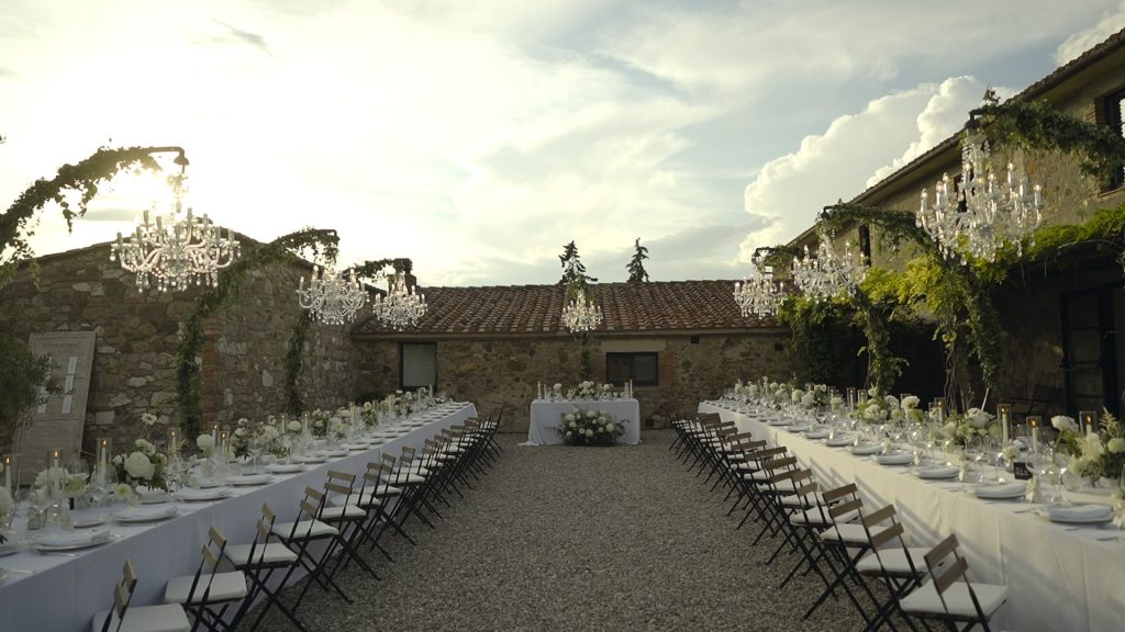 imperial tables in the courtyard of a residence in tuscan hills